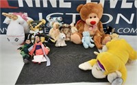 assortment of teddy bears and stuffed animals