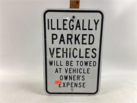 Metal street sign towed vehicle