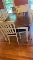 Table with pop up leaf and 8 heavy chairs