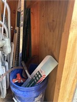 Scrap Metal in Corner of Shed and Bucket of Garden