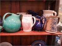 Seven pitchers including stoneware,