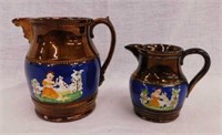 Two 1860's copper lustre English cream pitchers,