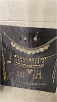 Belly Dancer Jewelry Mounted on Board