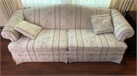 Two cushion floral print sofa by Elder Beerman