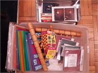 Container of file folders, clip picture frames,