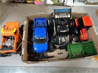 Box of RC Cars/Trucks - New Bright (As is/Missing