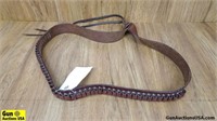 Bandoleer. Very Good. One Leather Bandoleer. . (64