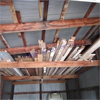 Misc lumber in rafters of shed