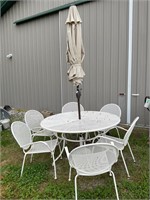 wrought iron patio table and chairs with umbrella
