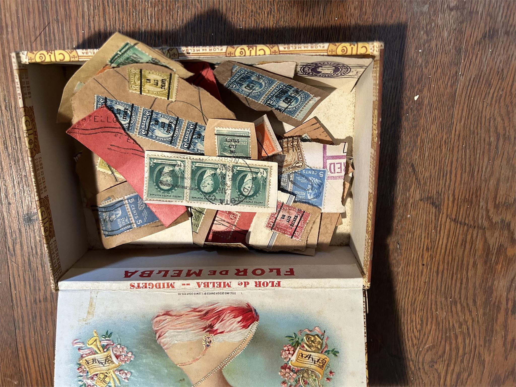 Stamps in cigar box