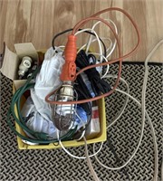 Grouping of electrical cords and shop light