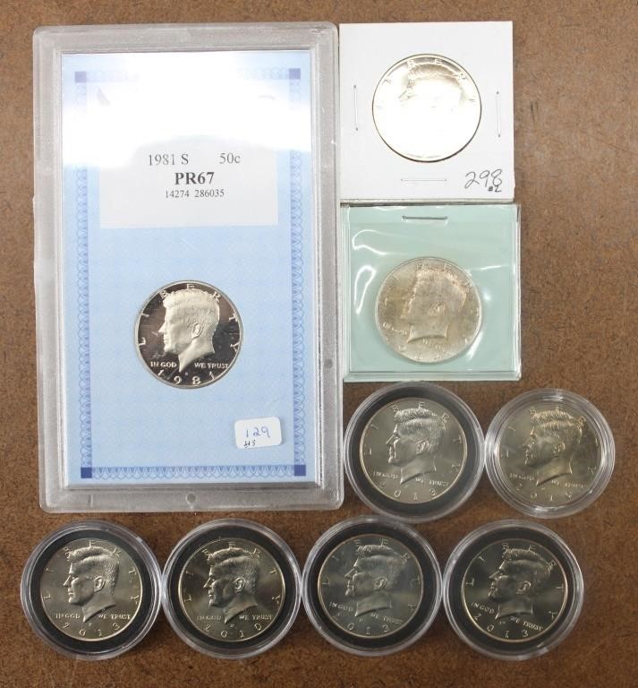 Lot of 8 Kennedy Halves