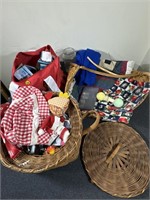 Baskets with sewing items. Red bag with contents