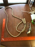 Antique jump rope and cap gun