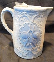 Blue and white salt glaze handled pitcher