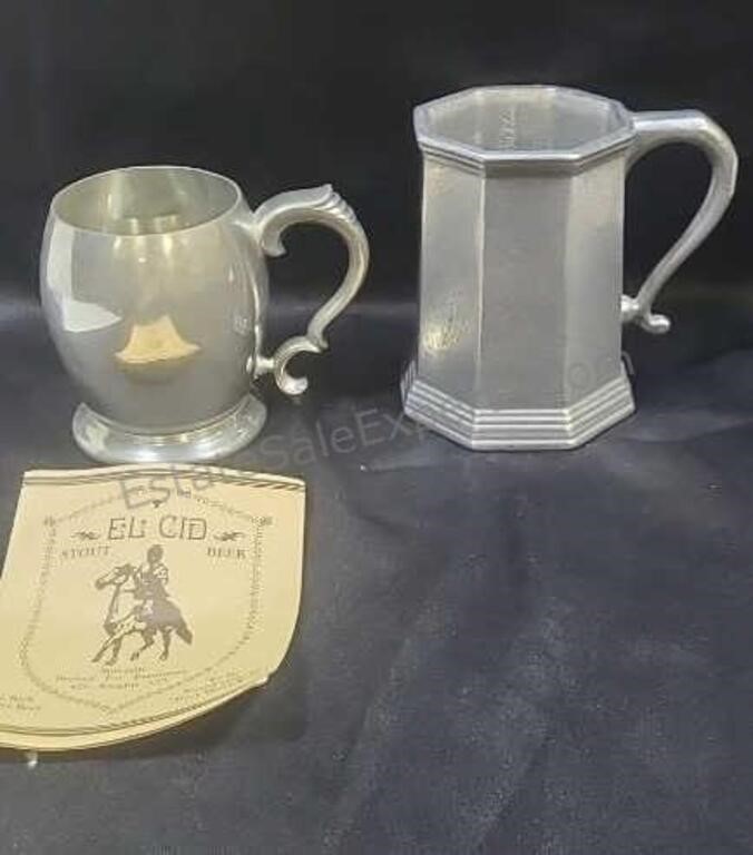 Pewter beer steins.