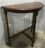 Small arc wooden table measures 25x12x26
