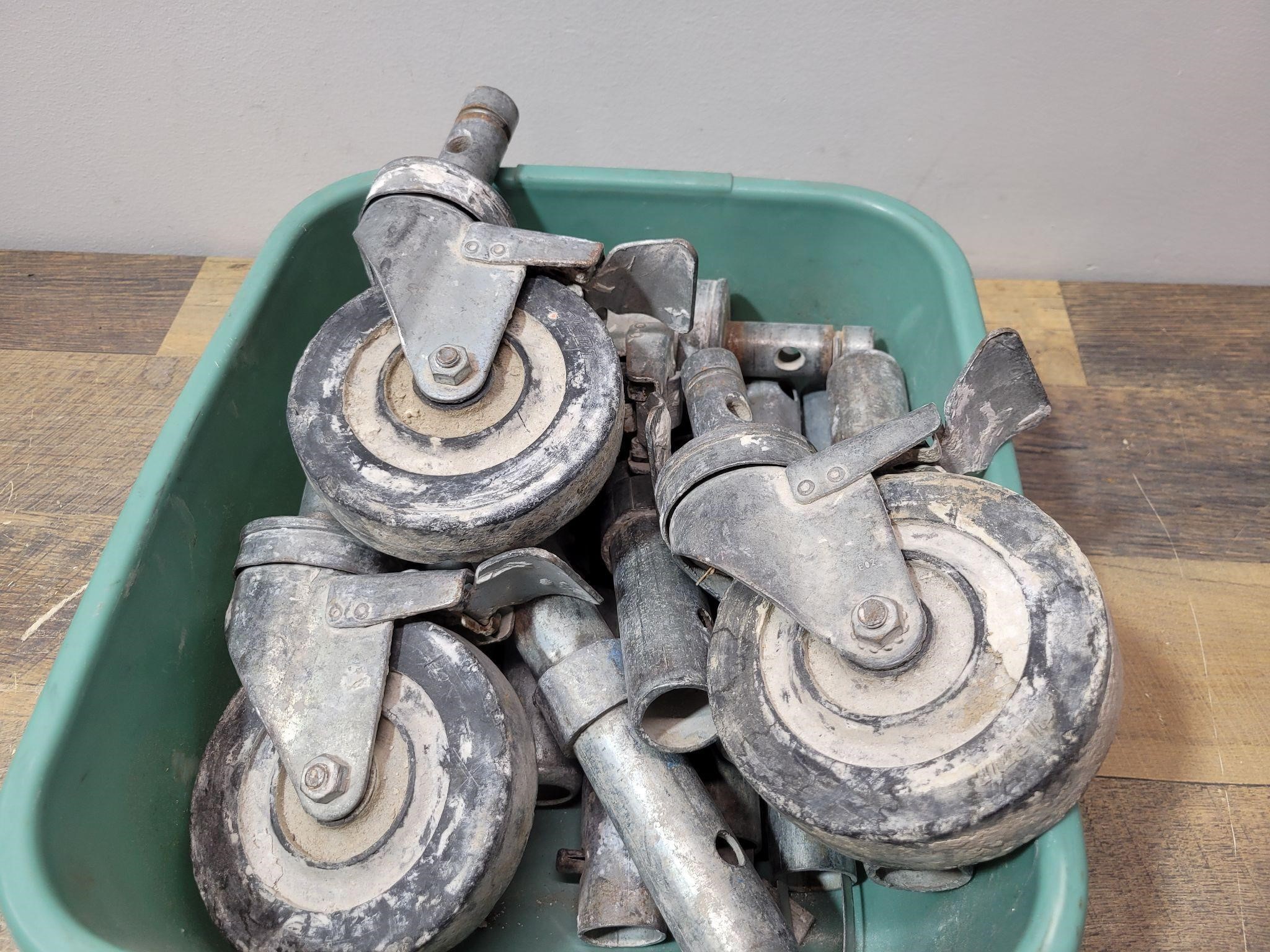 Bin of Scaffolding Wheels and Pipes