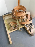 Collection of Philmont leather belts and washboard