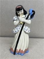 Porcelain girl with staff