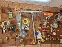 Contents of peg board hand saws and more