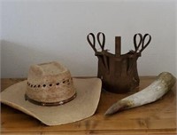 Cowboy hat, horn, antique calf weaning muzzle