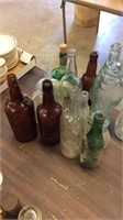 Early bottles, green, clear, and brown