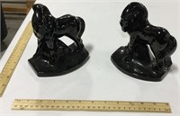 2 black ceramic horse figurines