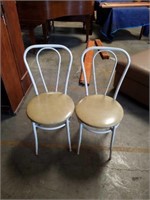 2 Fifty's metal side chairs