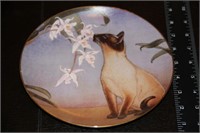 "Nose in Bloom" plate by Irene Spencer