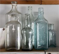 Lot #4336 - (7) antique druggist bottles in