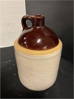 Handled crock jug with crack