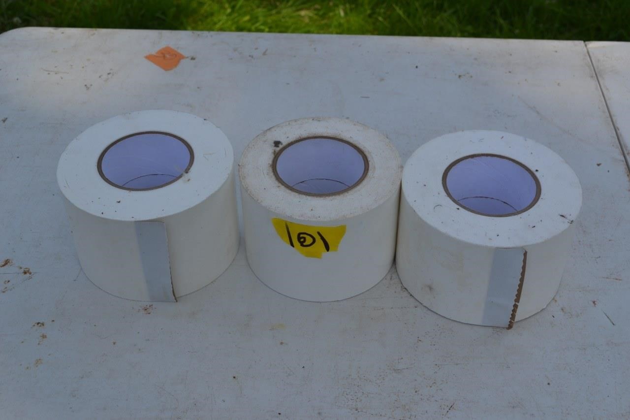 101: 3 large rolls of white tape, 4in