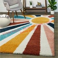 4’X5’6" sun rays area rug