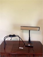 Desk lamp and tab lift