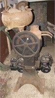 Antique meat grinder with attachments. Measures
