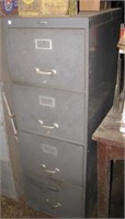 Coal Steel metal four drawer filing cabinet.