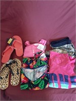 Ladies clothes and flip flops size small