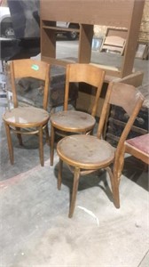 Three ice cream wood parlor chairs