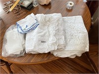 Lace table clothes, placemats, all. 294-295