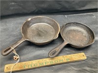 2 cast iron pans