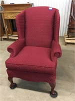 Upholstered wing chair. Matches lot 20.  Shipping