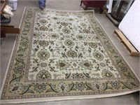 11 ft 3 in x 7 ft 11 in area rug.  In good