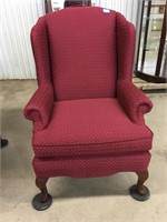 Upholstered wing chair. Matches lot 21. Shipping