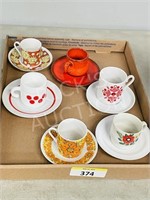 assorted demi tasse cups & saucers