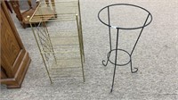 Two metal plant stands.  One is mid century. Both