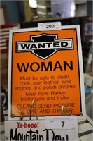 PORCELAIN WANTED WOMAN SIGN