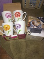 New in box set of 4 mugs and flowing fountain