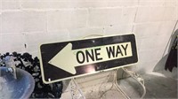 Metal "one way road sign measuring 3 foot long and