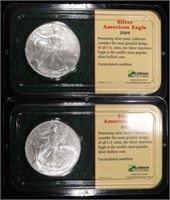 (2) 2004 AMERICAN SILV EAGLES (LITTLETON HOLDERS)